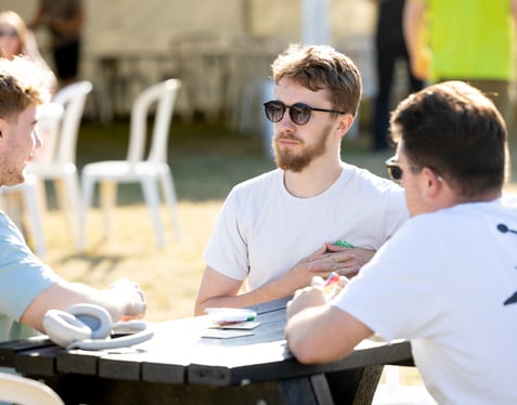 Foundation - a Group of Alumni During a Discussion