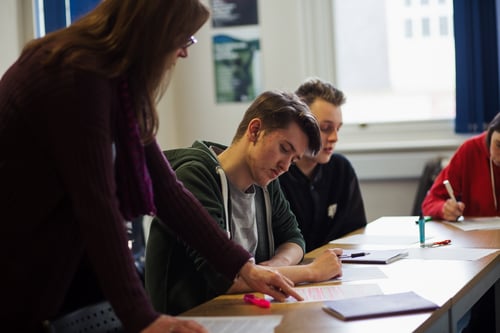 6th-Form - Support - A Tutor Helping a Student With His Work